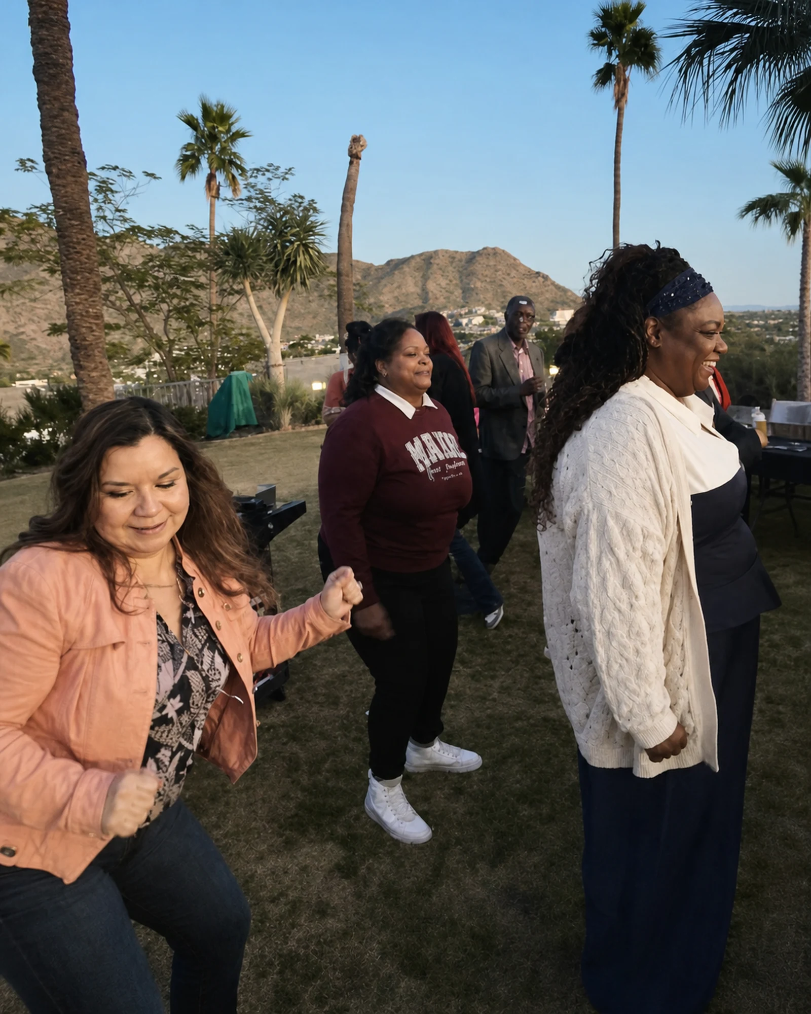 Hibachi chef entertaining guests during an outdoor celebration