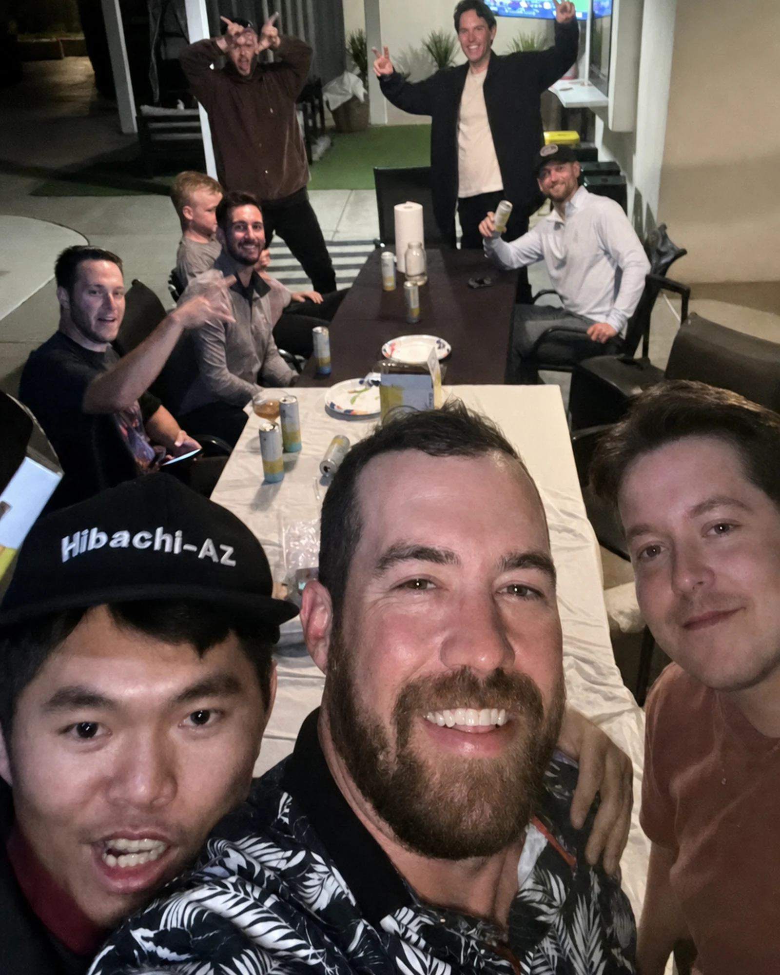 Happy Mesa hibachi catering guests taking a group selfie after dinner