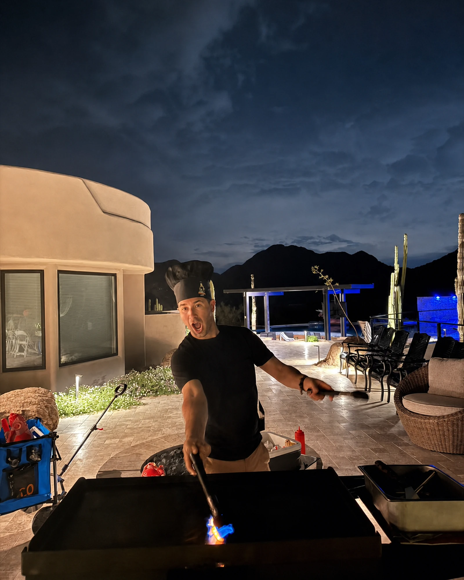 Private hibachi chef creating a flame show at an outdoor Gilbert group event