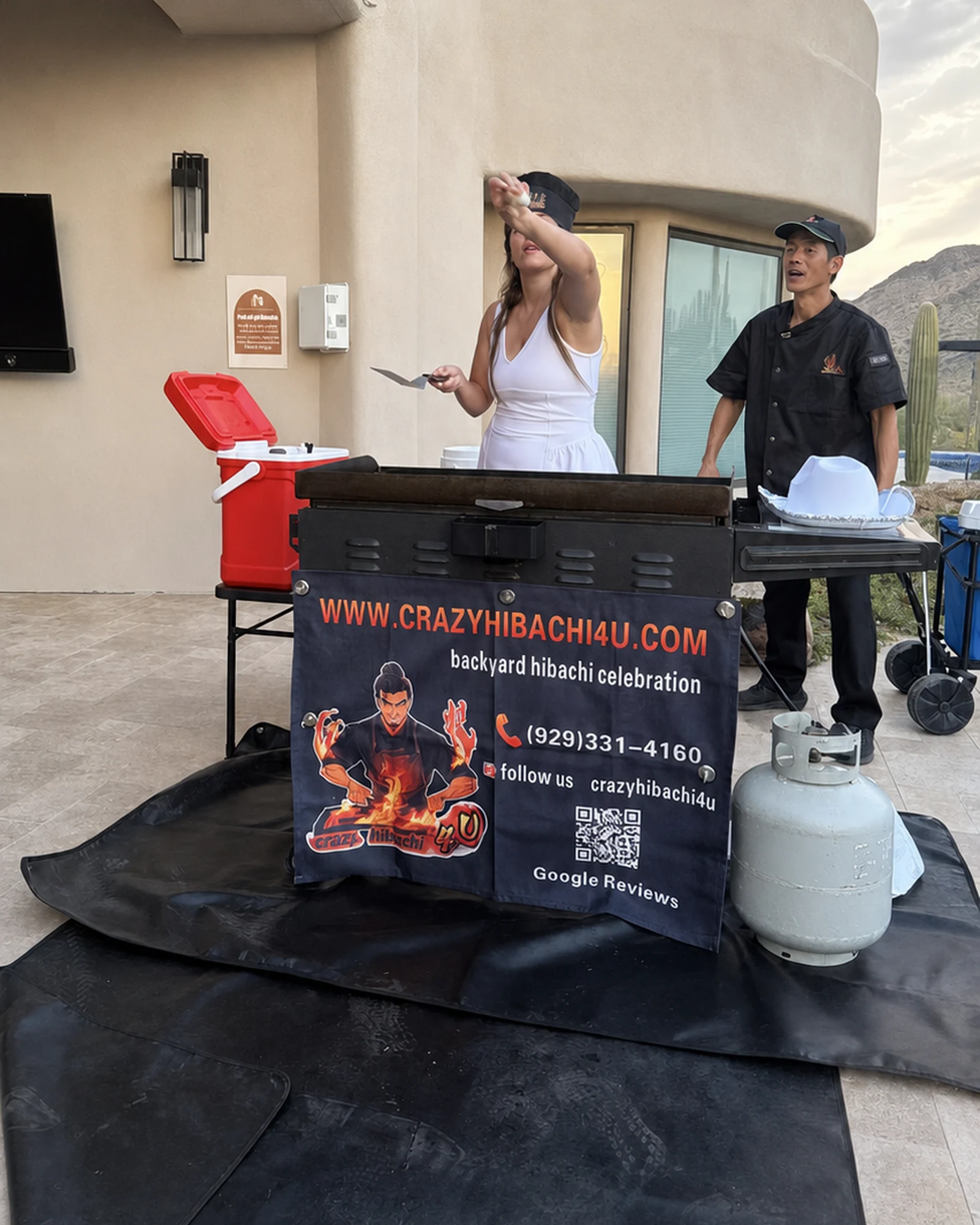 Tempe event guest participating in a hibachi chef challenge