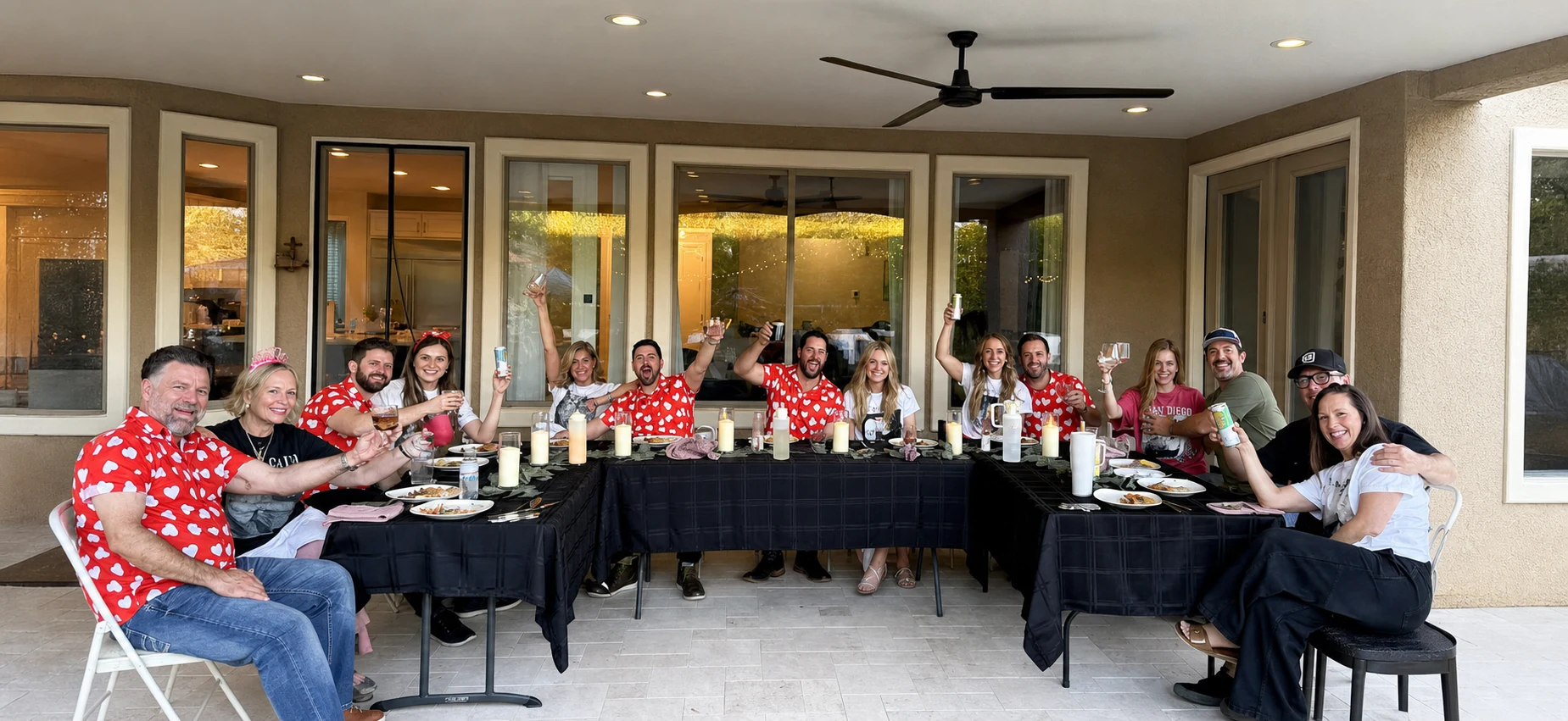 Guests raising a toast together on a patio during hibachi dinner