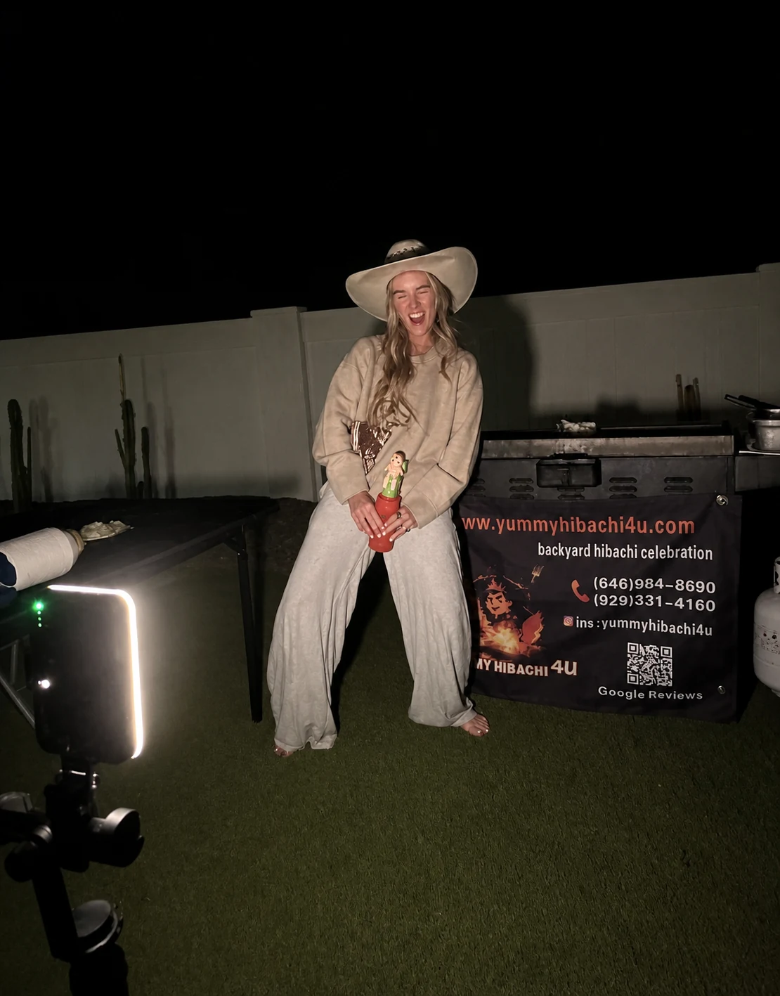 Cowgirl-themed guest joining a hibachi squeeze-bottle game
