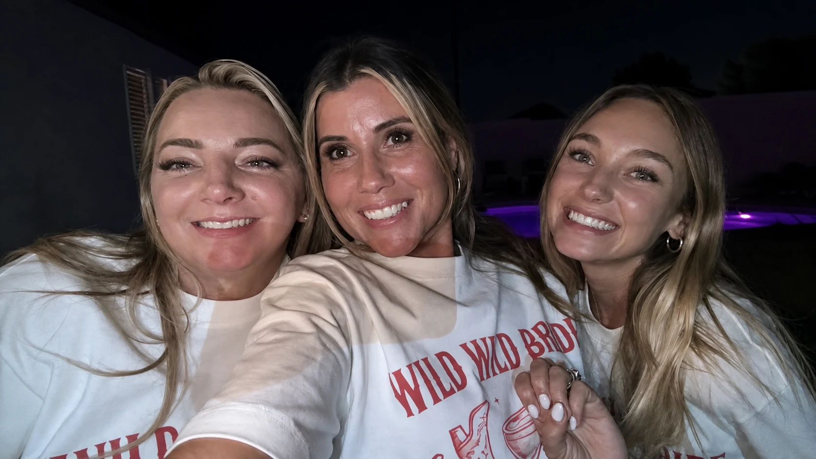 Bachelorette group taking a nighttime selfie at a hibachi party